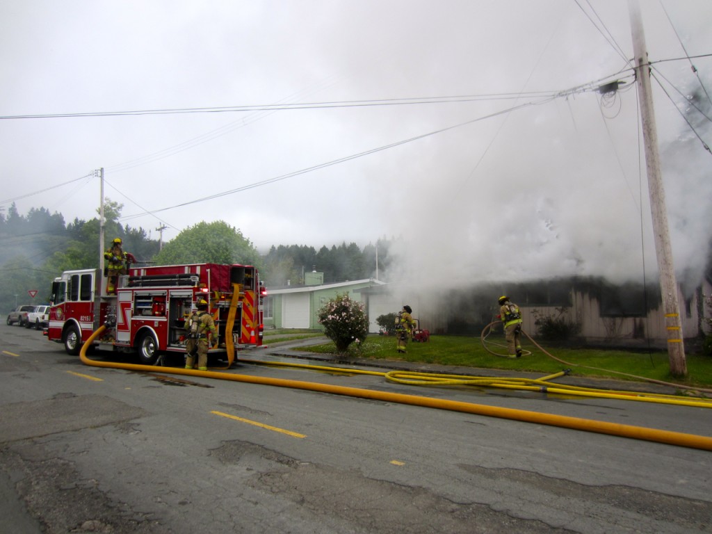 The McCarins' Crescent Way home goes up in flames. Photos by KLH | Eye