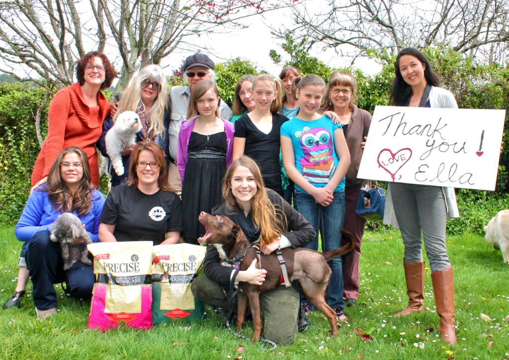 Top left, Ella and her mis-healed left leg, which had to be amputated. Bottom left, Carmen and her newborn puppies. Right photo, left to right, back row: Kim Class, CAF Director; Lucy, dog; Victoria Mayes-Webb; John Webb; Sue Morse; Lisa Morehouse and Linda Palmrose. Middle row: Alexa Morehouse; Maria Morehouse; Kyra Myers; Asti Morris; CAF manager. Front row: Monica Diebold, CAF volunteer coordinator; Jen Wrask of Northern California Pet Supply & Grooming; Tara Cain, CAF adoption counselor and Ella’s foster mom; and Ella.  Photos courtesy CAF