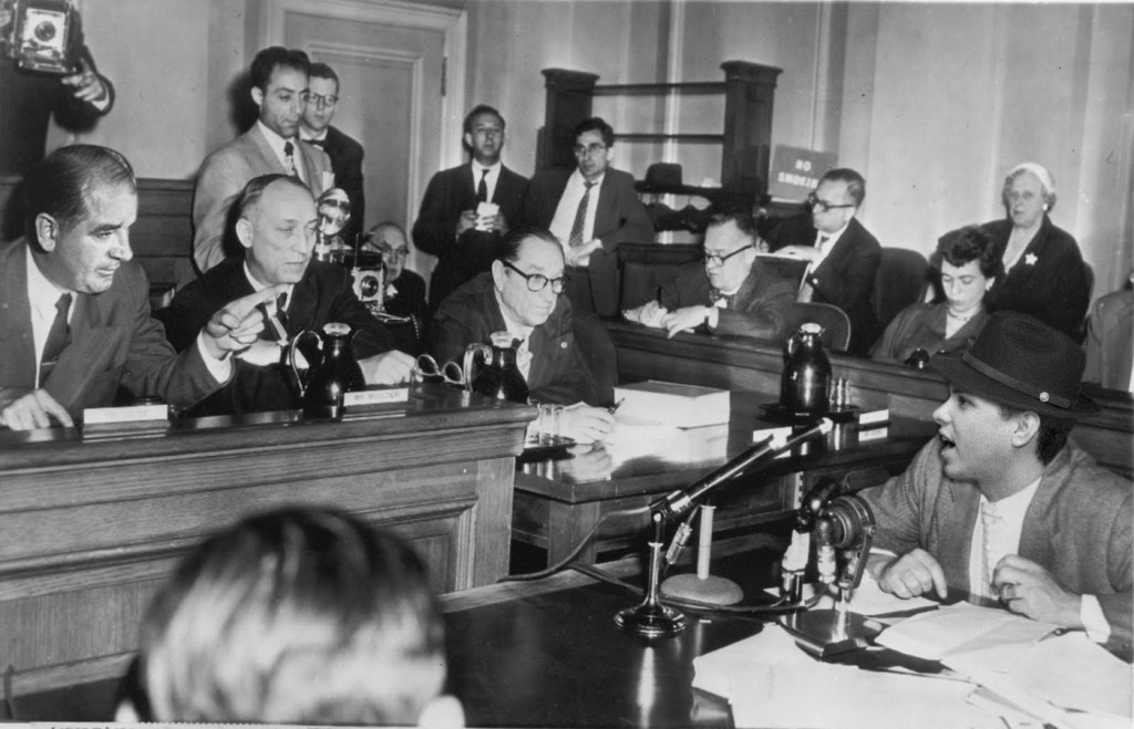 Mayor Brunton hunkers down in the face of Sen. McCarthy's harsh interrogation.
