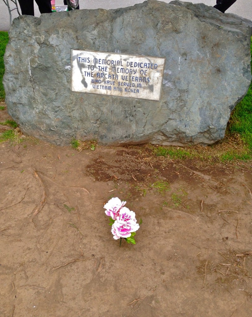 The area on front of the rock is heavily used for visiting. Someone wrote on the memorial plaque, and Rob cleaned it off as best he could.