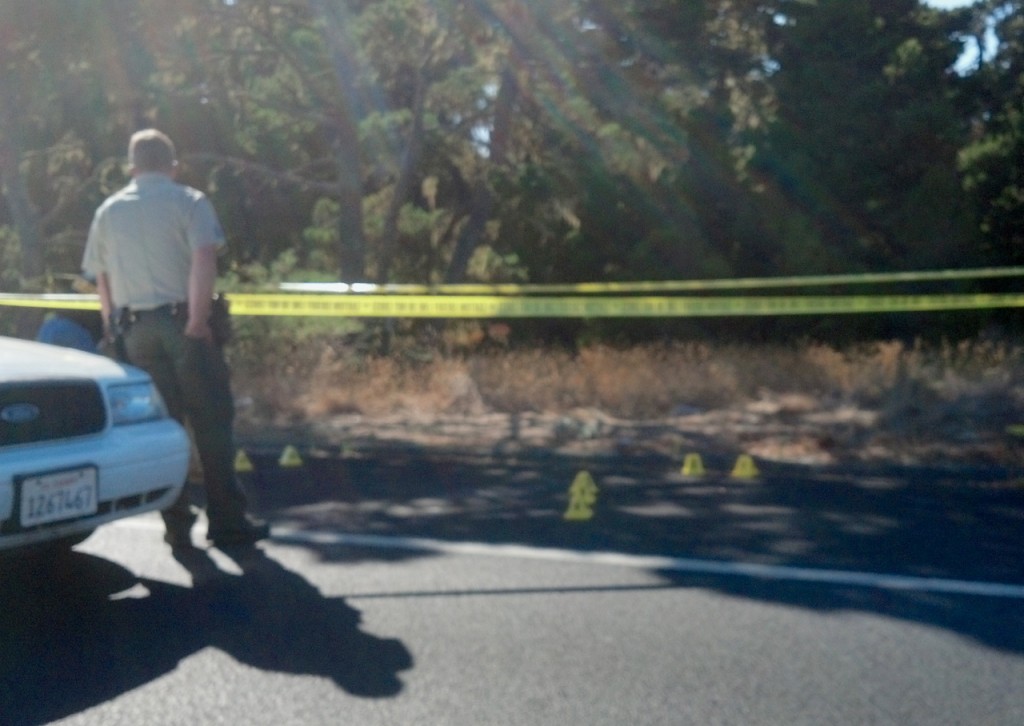 A sheriff's deputy at the crime scene. Photo by Ted Halstead