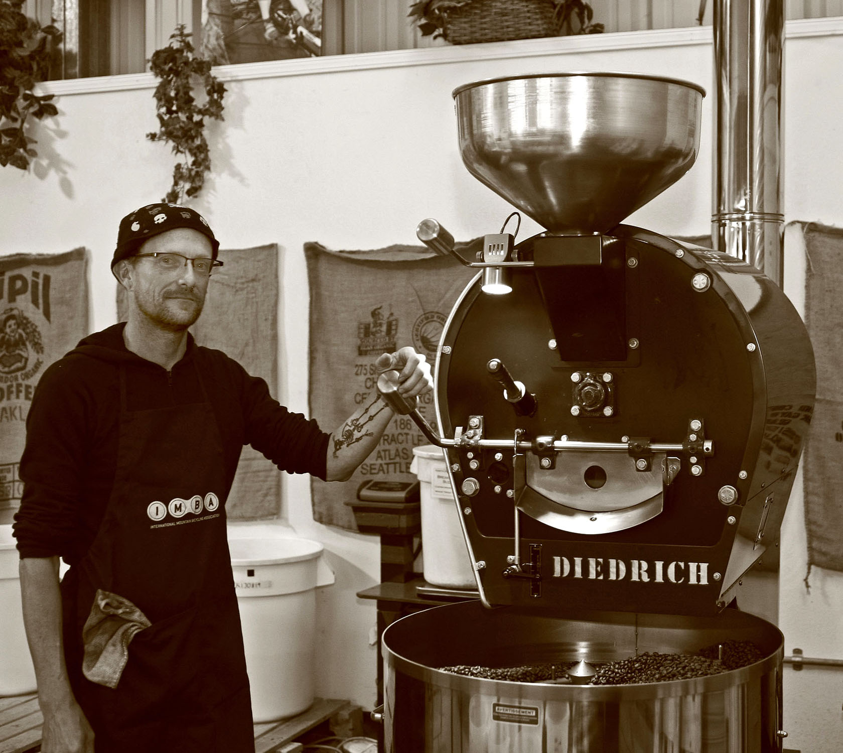 Kinetic Koffee roaster Kelly Brannon at the helm of Diedre, the Diedrich roaster. Photo by Matt Filar.